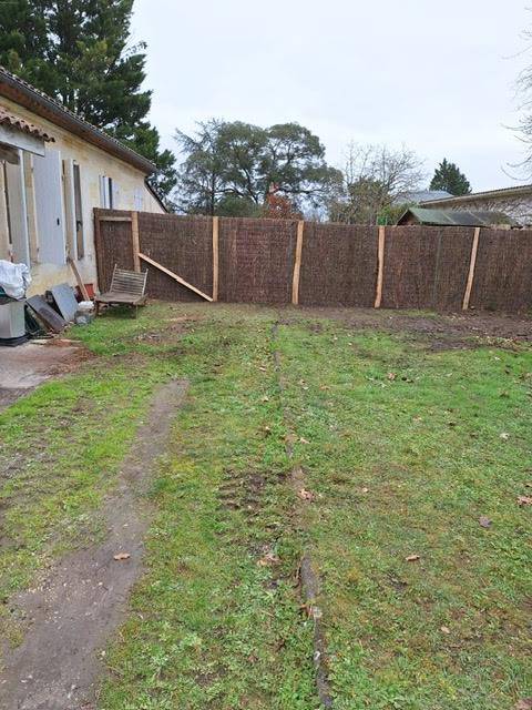 Devis pour remplacer une haie de jardin vers Ludon Médoc pour installer de la brande naturelle épaisseur 4cm 